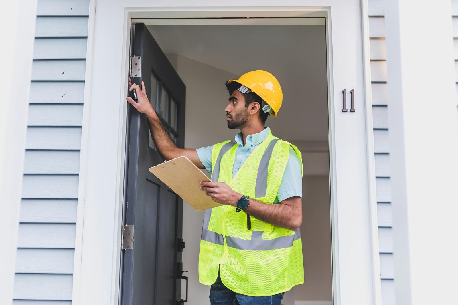 RoofPeoria inspector reviewing a property before a roofing estimate